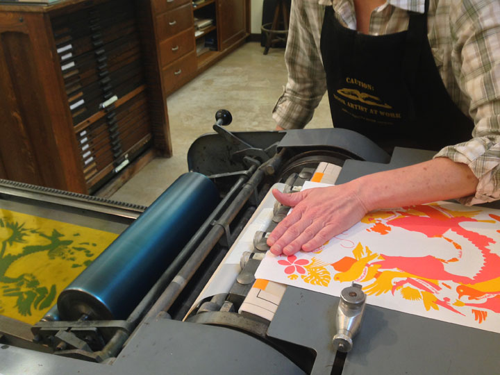 Process photo of "Song of Aloha" Dead Feminist broadside by Chandler O'Leary and Jessica Spring