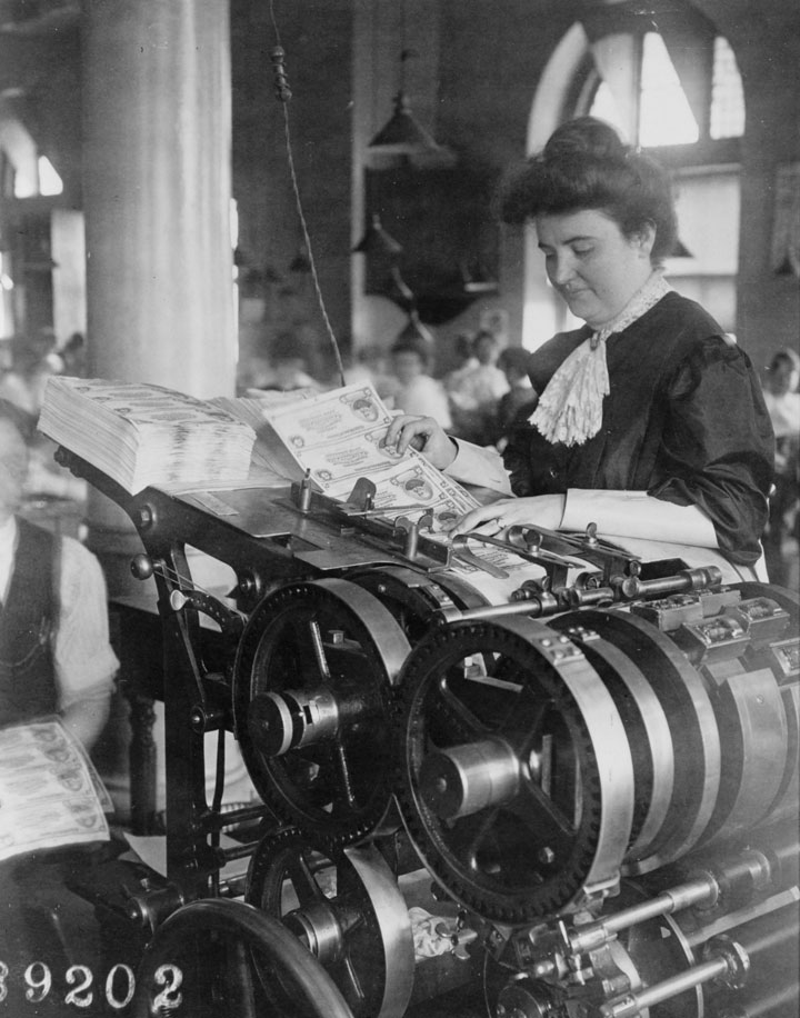 Historic image of woman printing, from the Library of Congress