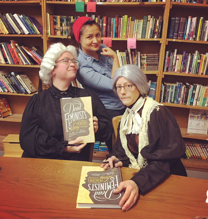 Costumed historical feminists at the Dead Feminists book launch at King's Books in Tacoma, WA. Photo by Eli Gandour-Rood.