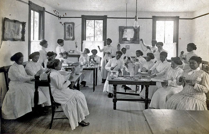 Students taking a vocational class at the National Training School for Women and Girls, courtesy of Library of Congress